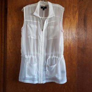 Cool white sheer vest.